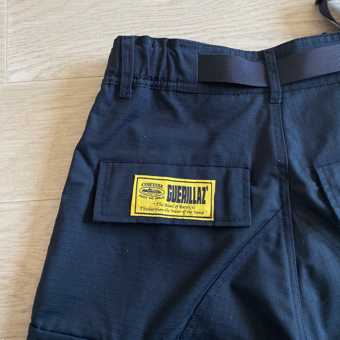 Corteiz Black White Logo Yellow Patch Cargo